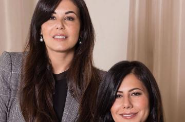 Two women smiling