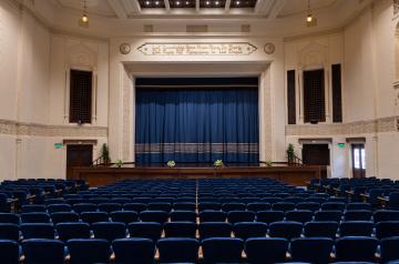 Ewart Hall with its stage and blue curtains