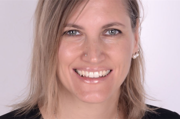 A woman smiling
