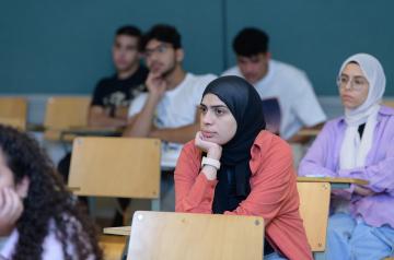 Veiled girl in classroom