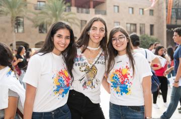 Three girls smiling