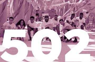 group of students smiling. 501 written on the picture in white