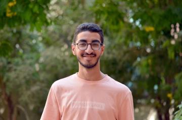 Mazen Tawfik smiles at the camera