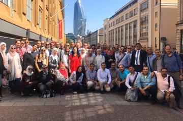 Members of the LEP program pose in a street