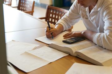 student in library