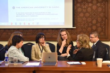 AUC staff on campus