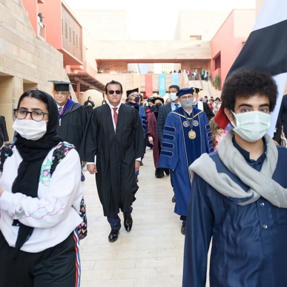 Students with flags at parade