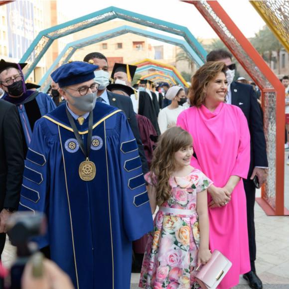 President Ahmad Dallal with his wife and daughter during the parade