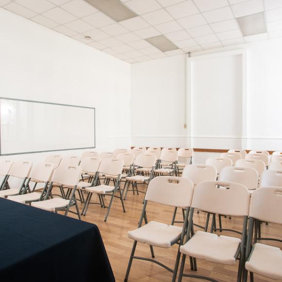 Chairs in a room and a table