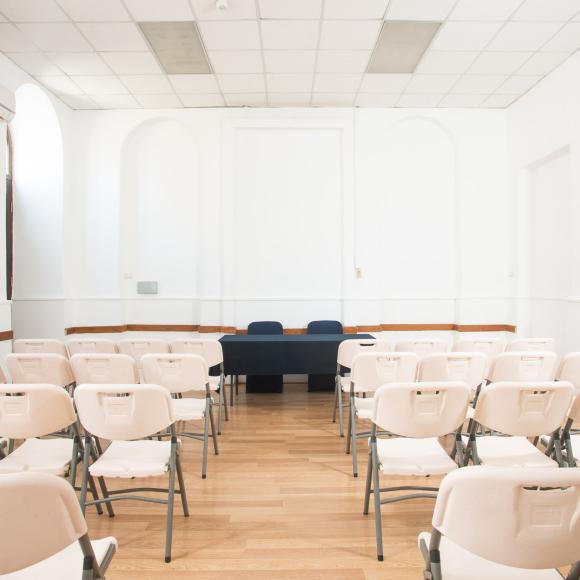 Chairs in a room and a table