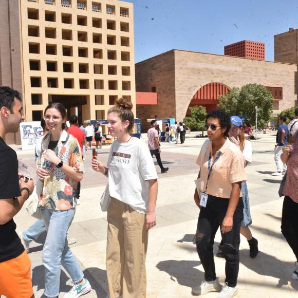 Girls and boys walking on AUC campus