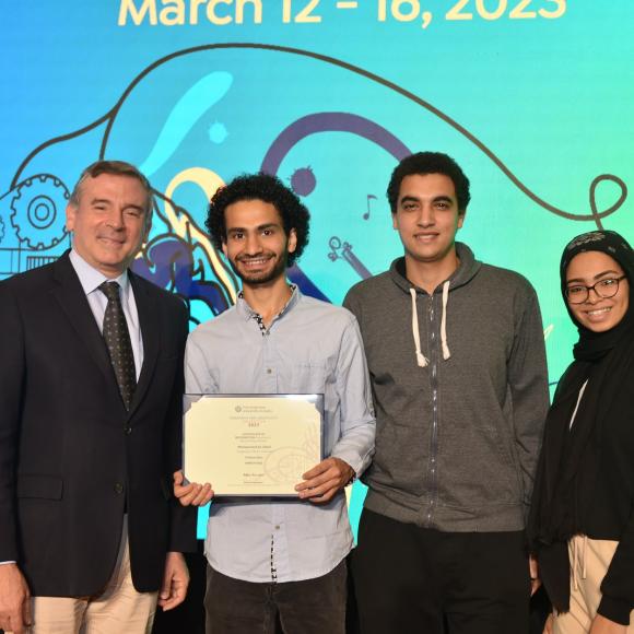 Group of people standing and holding certificates