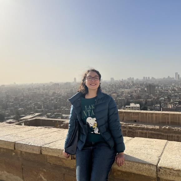 Student stands overlooking Cairo