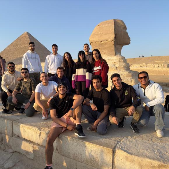 Students pose by the Sphinx