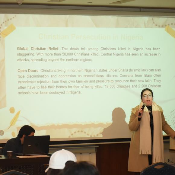 A female giving a presentation