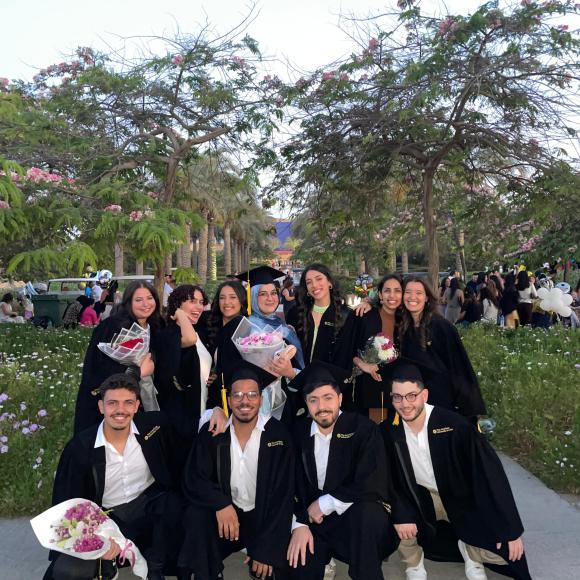 Husn with her friends at the Cap n' Gown 