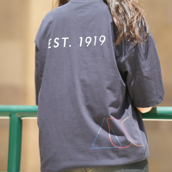Black shop shirt with "EST 1919"