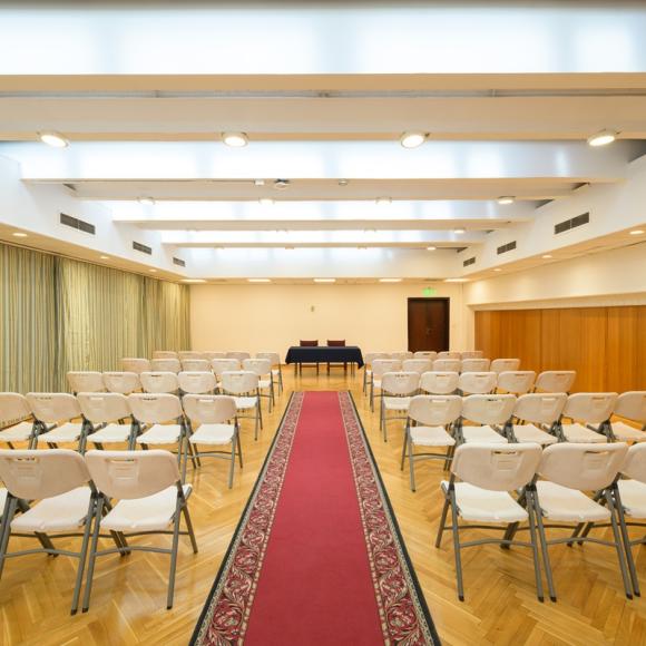 A room that has chairs in theater-style